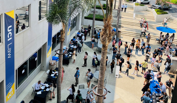 students gather in the law school courtyard